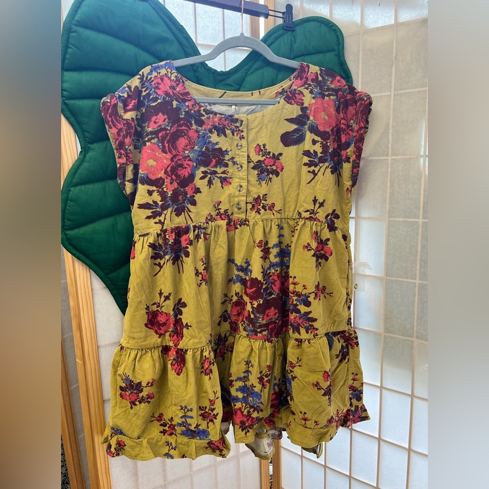 NWT Free People Harper mini dress. Corduroy tiered smocked. Color: Mustard